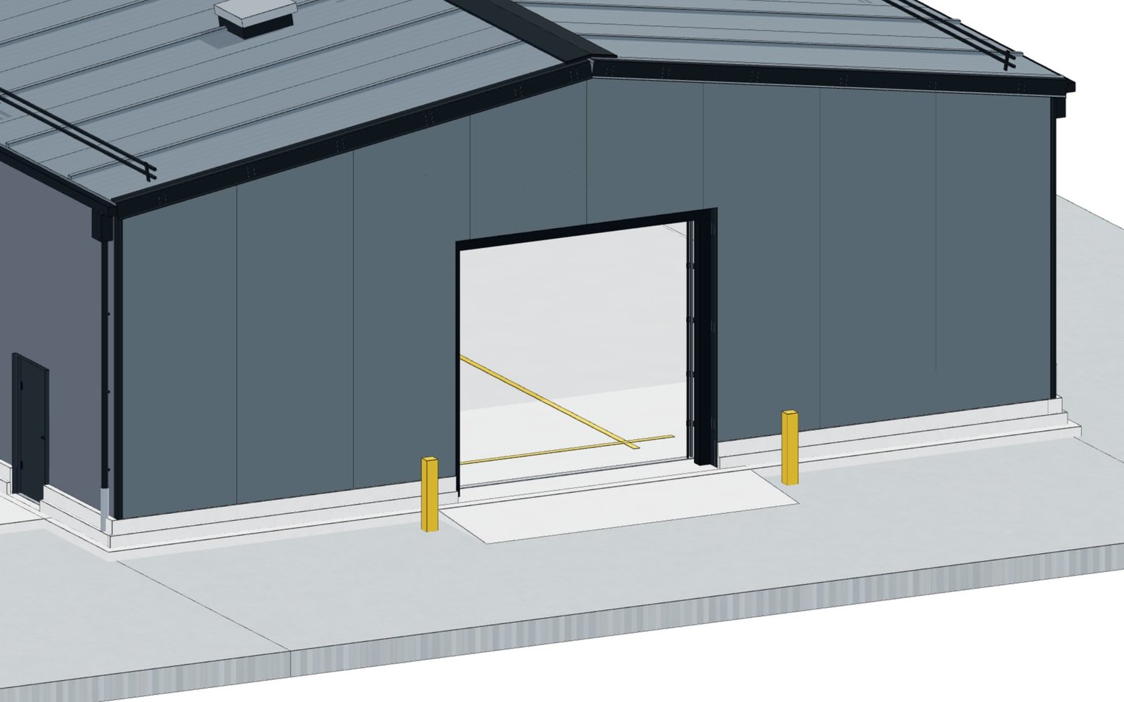 Gable end of the system building with sectional door, bollards and personnel door